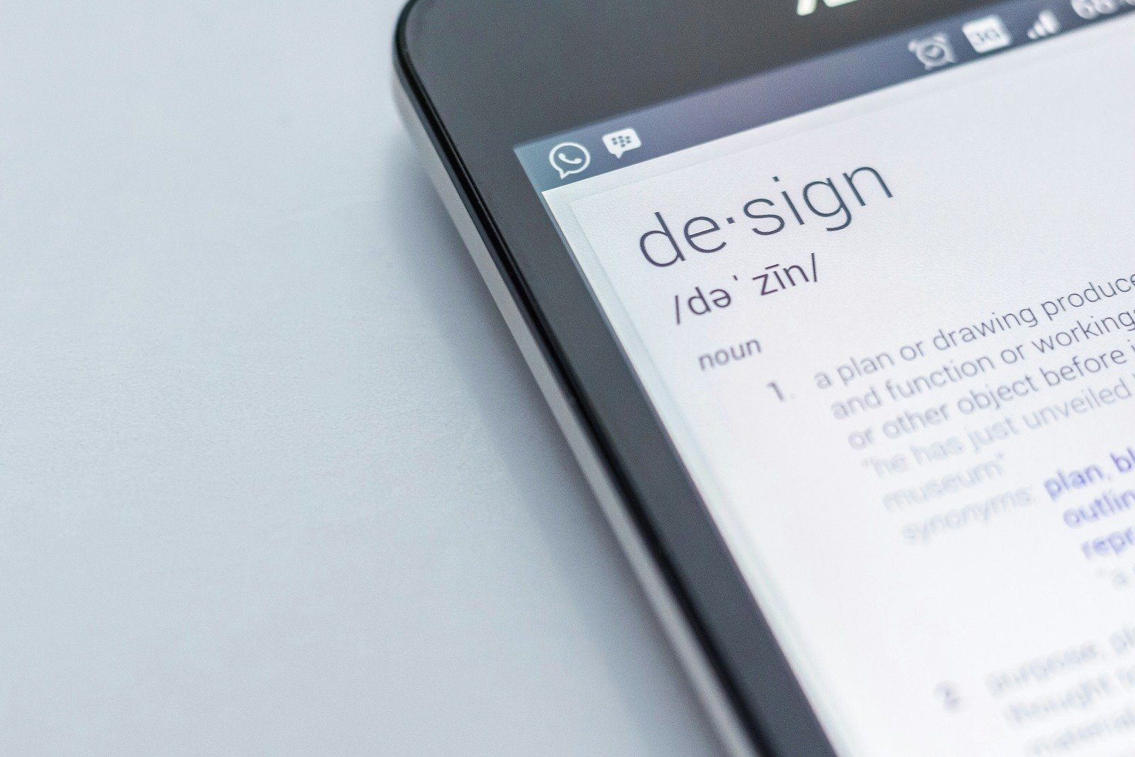 close-up-of-design-definition-on-smartphone-screen