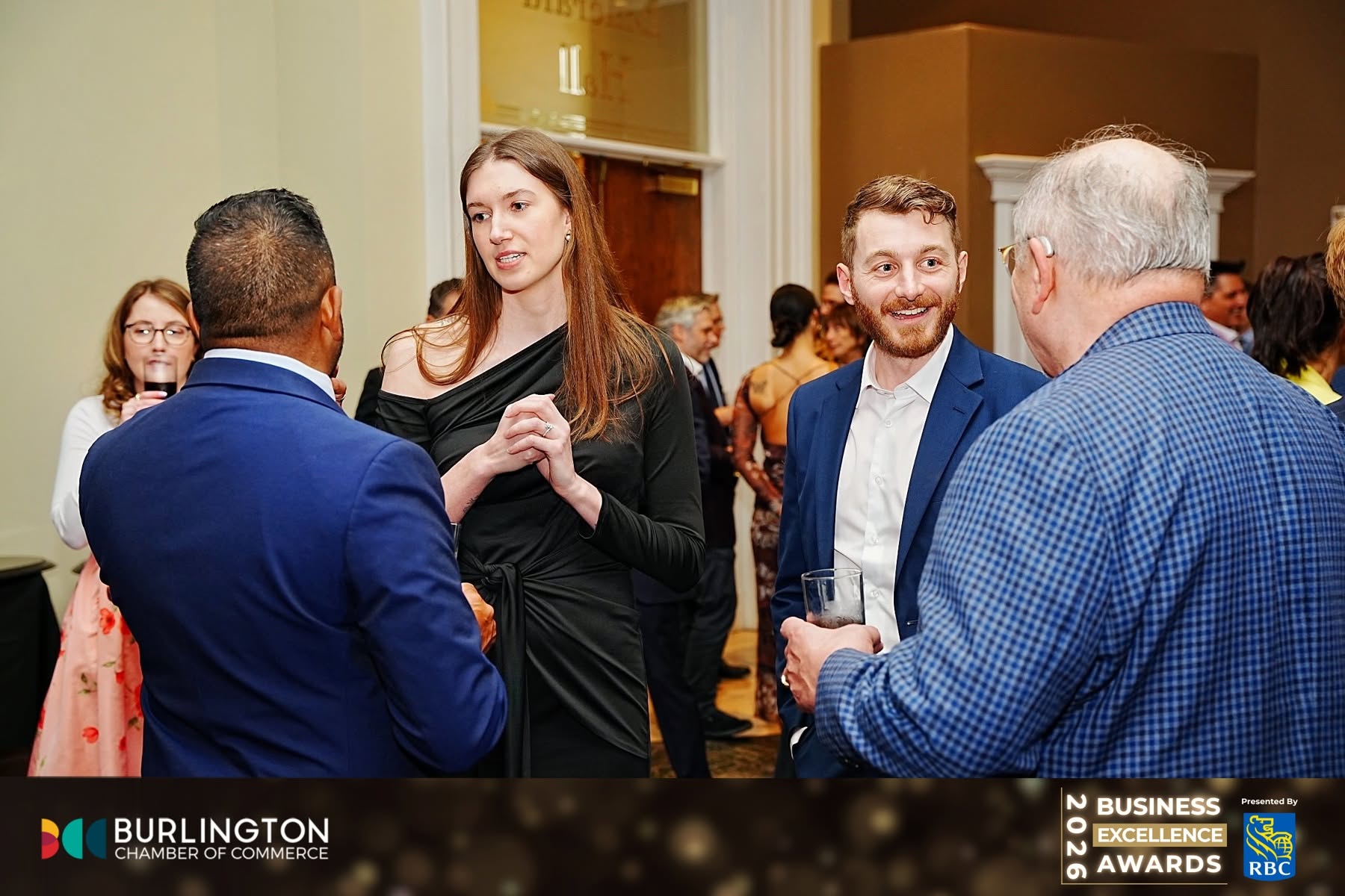 NewFrame Digital founders networking with other business owners at a local chamber of commerce event